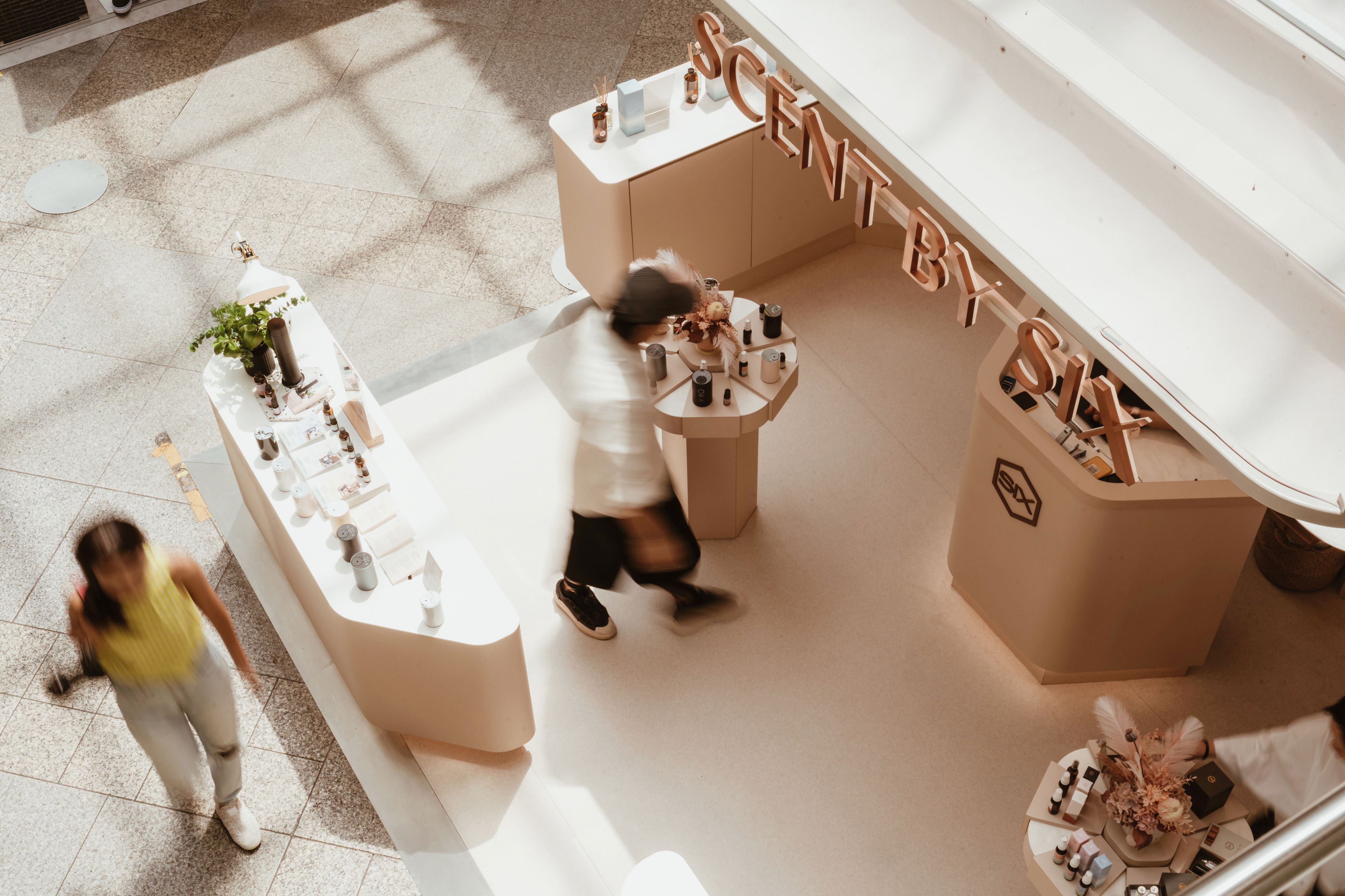 Top view of an inviting booth at Bugis Junction featuring a wide array of scents by Scent by SIX, designed by Pivot.